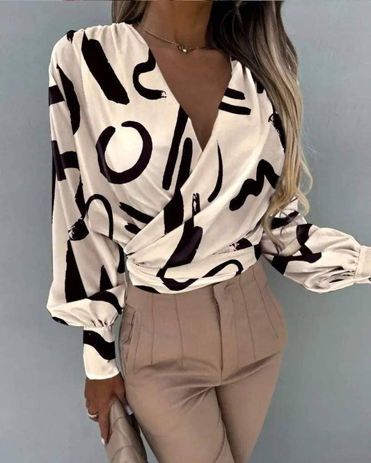 Abstract print lantern sleeve ruched wrap top