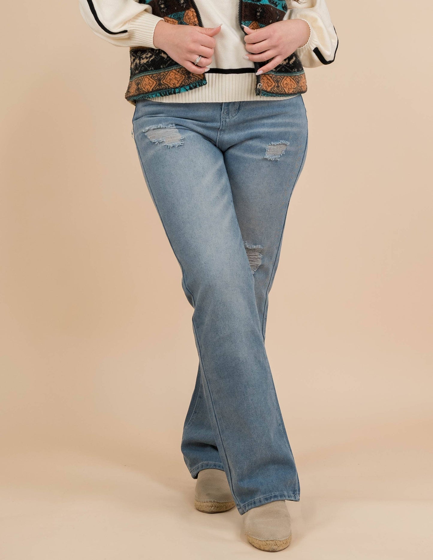 Blue fringe denim irregular raised waist trousers