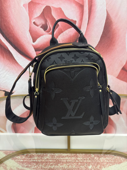 Inspired Embossed Monogram Mini Backpack