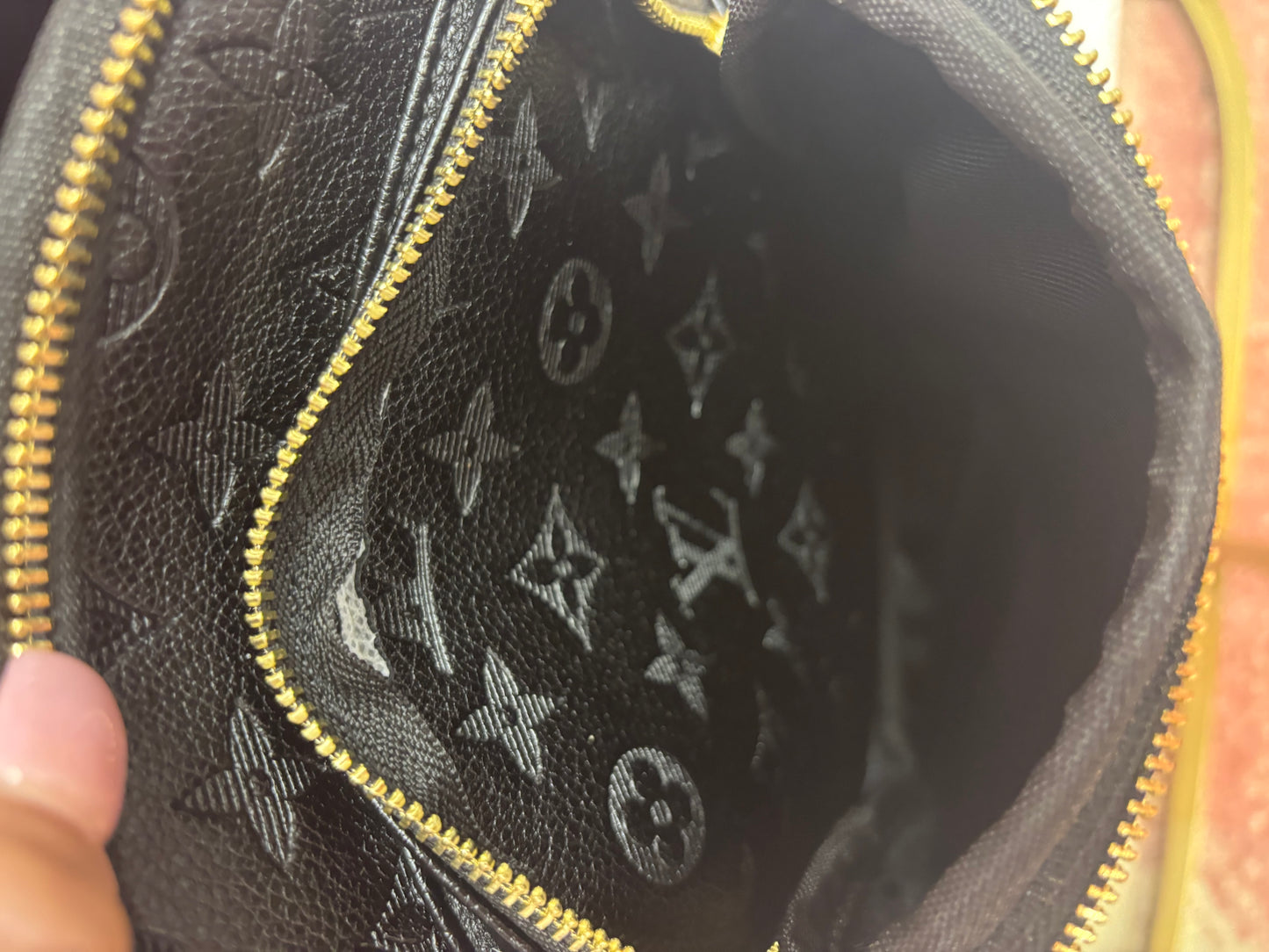 Inspired Embossed Monogram Mini Backpack