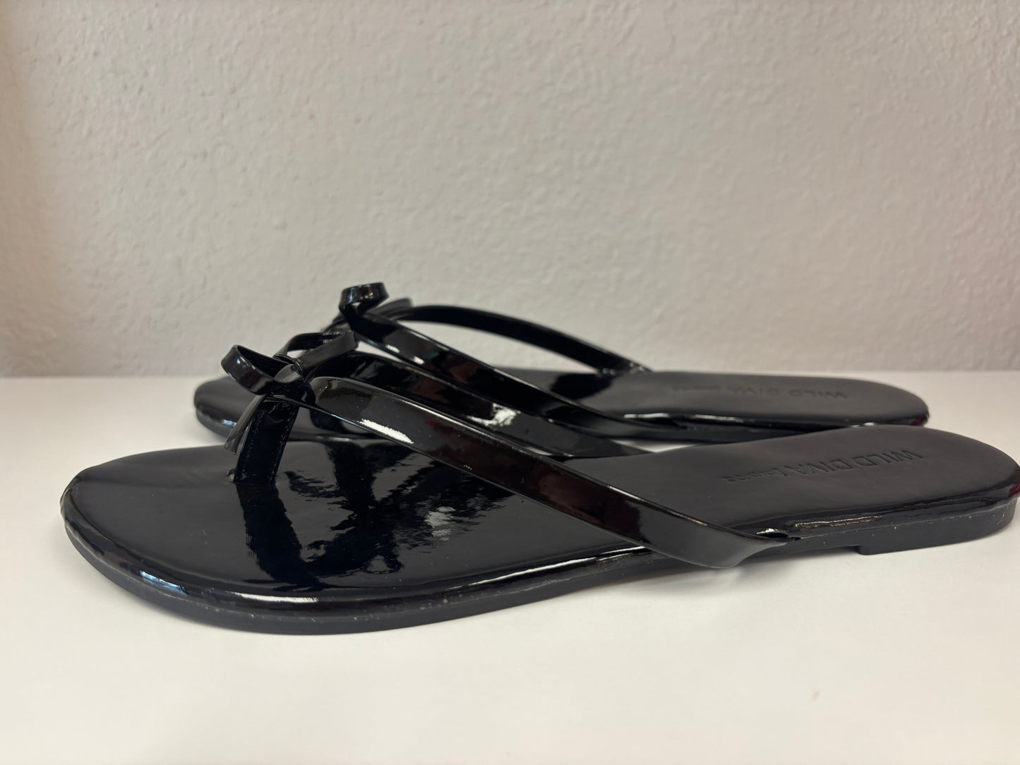 Black Bow Flip Flops