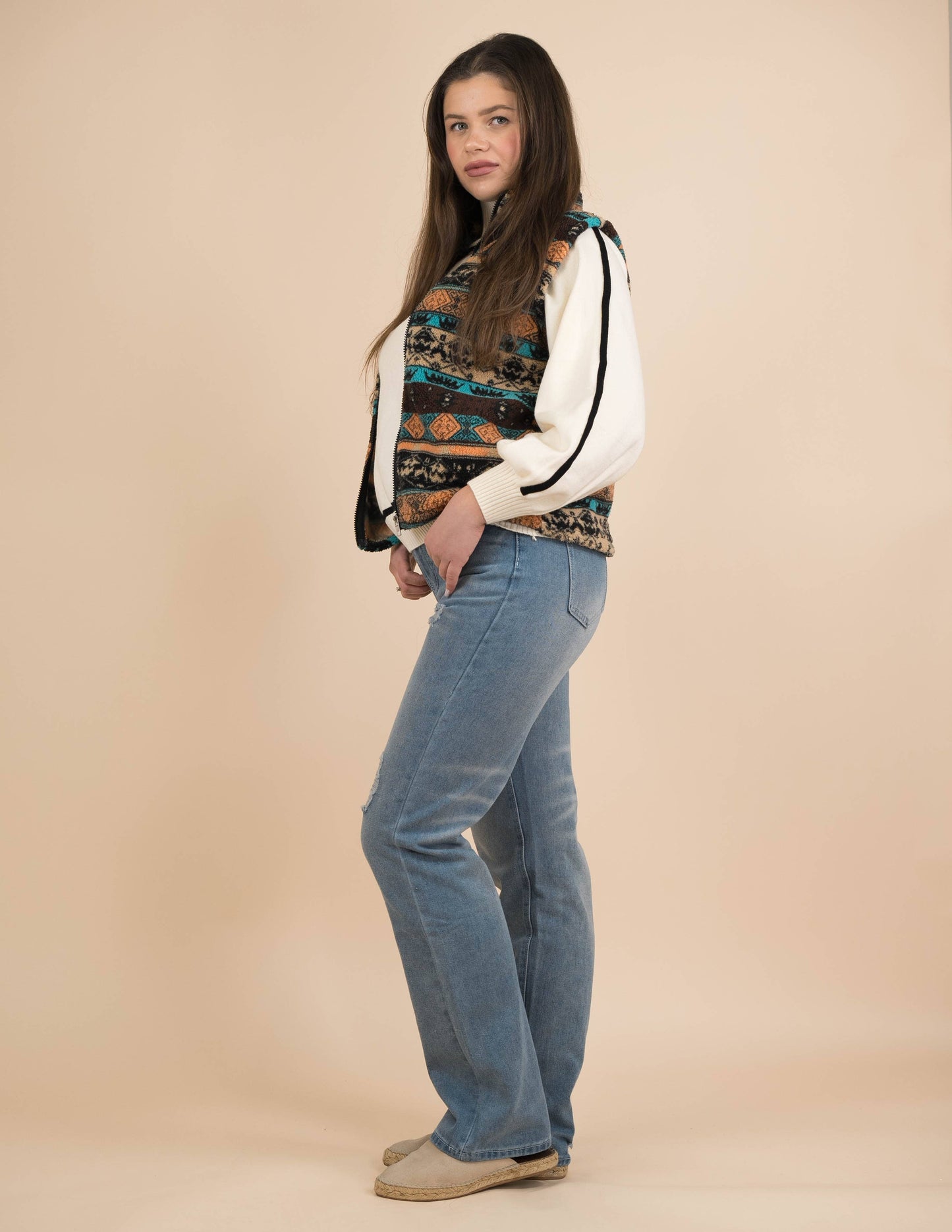 Blue fringe denim irregular raised waist trousers
