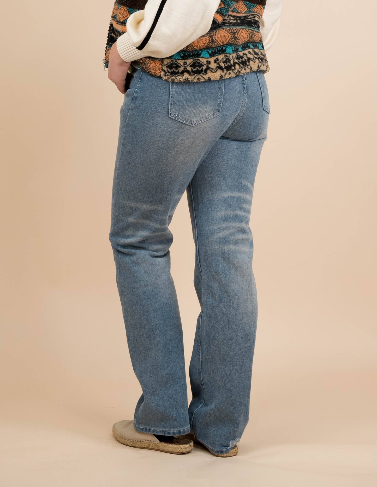Blue fringe denim irregular raised waist trousers